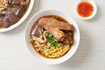 egg noodles with stewed and braised duck in brown soup