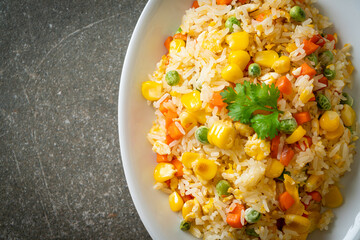 fried rice with mixed vegetable (carrot, green bean peas, corn) and egg