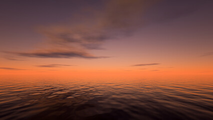 A beautiful sunset over the surface of the ocean.