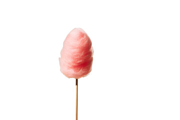 Sweet pink cotton candy treat on a wooden stick against a black background