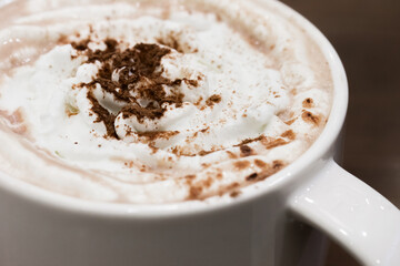 Cup of coffee with whipped cream