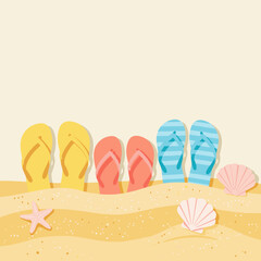 Colorful flip-flops and seashells on sandy beach with light background