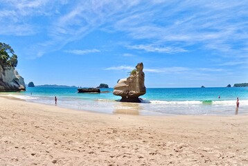 unique rock structure on a beautiful beach during a sunny day