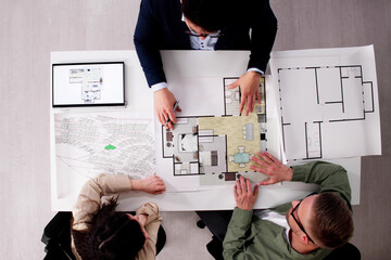 Family Consults With Real Estate Agent