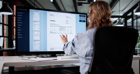 Elderly Accountant Calculates Bills On Laptop