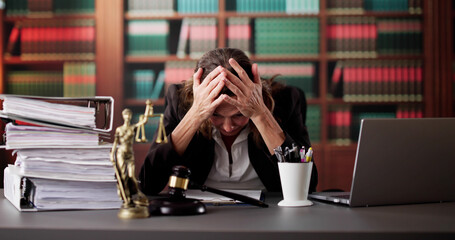Exhausted Female Lawyer Reviews Tax Invoices