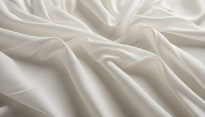 Obraz premium A close-up shot of white silky fabric with soft folds, exuding elegance and luxury.