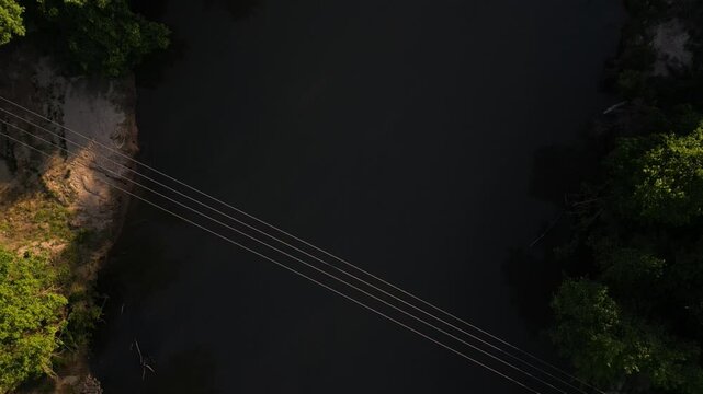 Top down close up aerial over Yadkin River in North Carolina at sunset