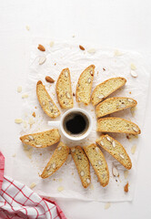 Traditional Italian pastry biscuit (cantuccini) with a cup of coffee , top view,copy space