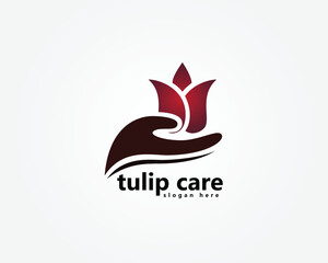 Fototapeta premium creative tulip flower logo,tulip flower with hand care icon,logo design inspiration