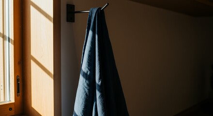 Garment Hanging on Hook in Sunlight