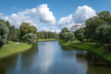Serene Canal Scene: Lush Greenery, Blue Sky, and Classic Architecture