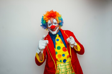 Clown surprised with white gloves up