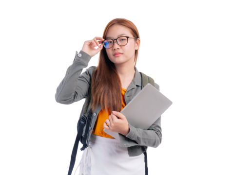 Confident Asian female student wearing glasses holding laptop and backpack, isolated on a transparent background, concept of education, learning, technology and modern lifestyle