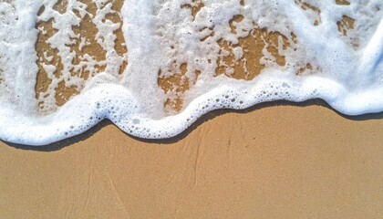 Obraz premium Waves crashing on sandy beach coastal environment aerial view natural beauty serenity