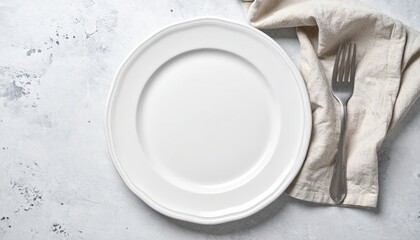 Setting the table empty plate with fork and napkin kitchen food photography minimalist overhead view culinary presentation