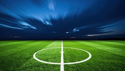 Obraz premium A serene soccer field under a twilight sky, showcasing vibrant green grass and a central circle, inviting play and competition