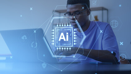 Man working on laptop with AI hologram interface in futuristic w