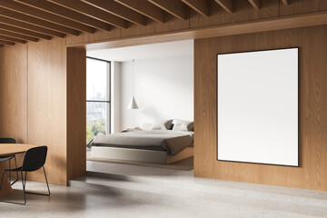 Modern bedroom and dining area with wooden walls, featuring an empty poster mockup on the wall in a cozy minimalist interior. 3D Rendering. 3D Rendering