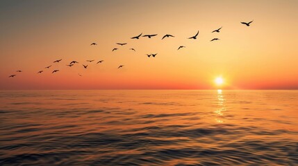 Fototapeta premium Serene Sunset Over Ocean with Flock of Birds in the Sky