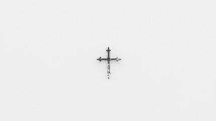 A black cross on a white background.