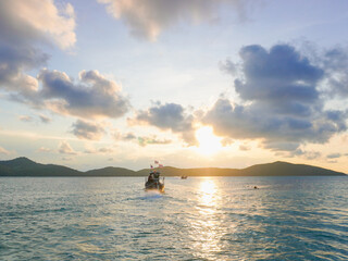 Landscape, sea, sky and clouds with the evening atmosphere of the sunset. The beautiful of nature, the environment and the sea during the summer holiday. happy time in vacation travel. Travel Thailand