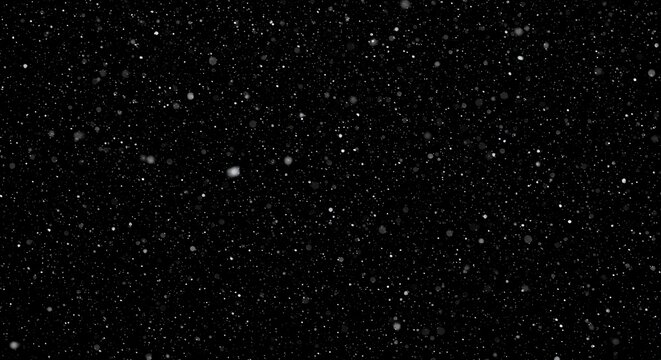 Sparse white dots on dark backdrop