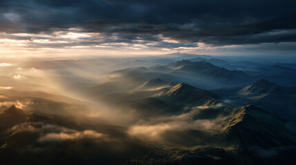 Obraz premium Ultra-realistic panoramic view of alpine mountains at golden hour, with sun rays piercing clouds, glowing mist, and dramatic forest shadows. 