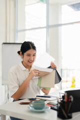 Architect offer apartment finishing material to client before renovation. Interior designer advises client to choosing materials and color tones, focusing on design elements, creative concepts.