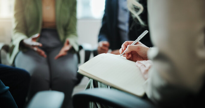 Business people, hands and writing with book in meeting for support group, therapy session or counseling. Closeup, hr or taking notes with team for company dispute or conflict resolution at workplace