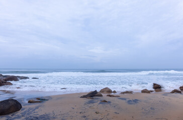 Beach landscape, Beautiful arial view of beach with sea waves and coconut trees. Nature scenery. 