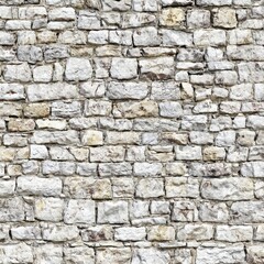 Close up view of a stone wall with varied color blocks