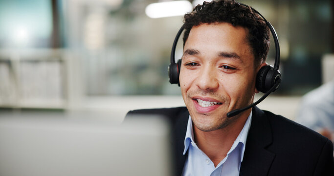 Man, call center and computer in office with smile for contact us, communication or telecom agency. Consultant, customer service and CRM help desk with support, advice and agent in workplace