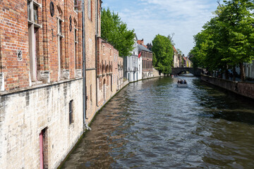 Views of canals, briges and old facades of medieval buildings in Bruges, Flanders, Belgium, travel destination