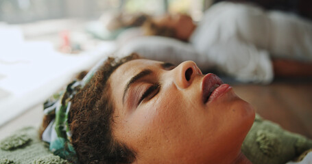 Relax, calm and woman at guided meditation class for mindfulness, peace and balance practice. Zen,...