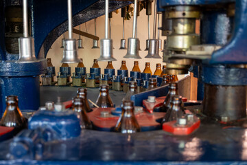 Old bottling line for Belgian beer in brewery in Bruges, tasting of beer, tourist destination, Flanders, Belgium