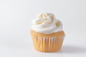 Vanilla cupcake with swirled white frosting on top
