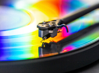 vinyl record with colorful lights reflection