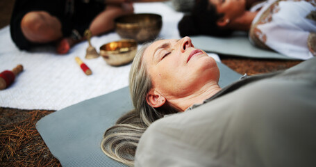 Woman, sound and meditation with tibetan bowl for spiritual healing or alternative medicine in...