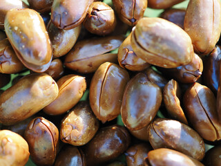 Roasted, shelled, dark brown peanuts