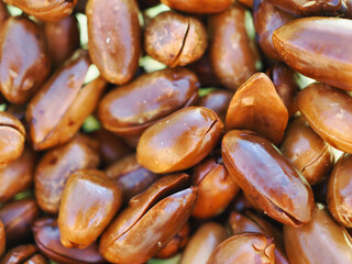 Roasted, shelled, dark brown peanuts