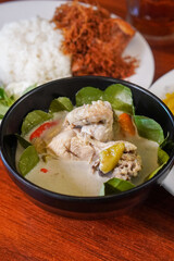 Indonesian-style dish, captured on May 10, 2025. A flavorful combination of spices, herbs, and traditional ingredients, showcasing the bold and authentic taste of Indonesian cuisine