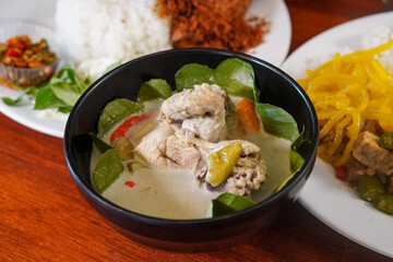 Indonesian-style dish, captured on May 10, 2025. A flavorful combination of spices, herbs, and traditional ingredients, showcasing the bold and authentic taste of Indonesian cuisine