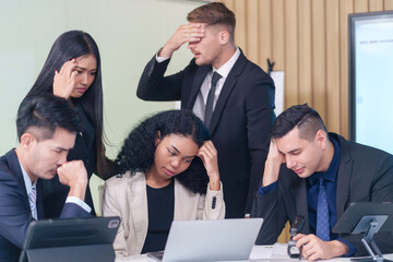 frustrated multiracial business people seriously meeting in office room,bad condition business conference,problem,worry of results business crisis