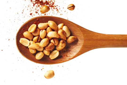 Coated peanuts paprika and pepper on wooden spoon isolated on white background PNG