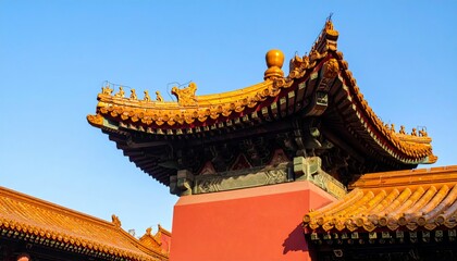 Obraz premium Traditional Asian Architecture with Ornate Roof Against Blue Sky