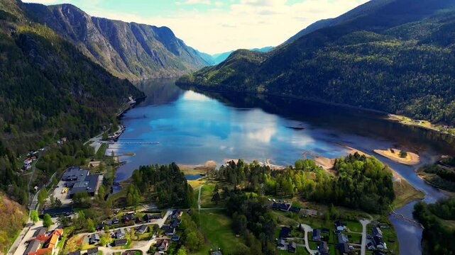 Green mountain slopes falling straight into the blue lake... A dream! Dalen in Norway