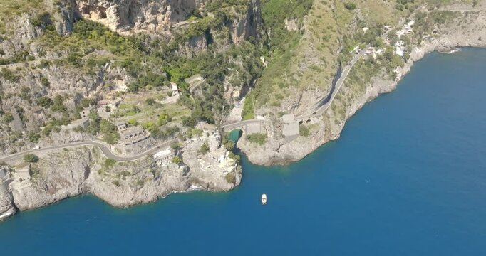 Aerial view of the Furore fjord bridge, a little hidden treasure of the Amalfi Coast, in the province of Salerno, Campania, Italy. The road that crosses it is the Amalfi Drive.