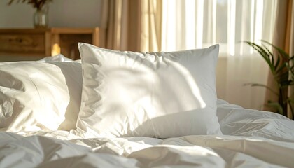 Sunlit White Pillows on a Crisp Bed