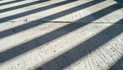Shadows of Stripes on Textured Concrete Surface in Natural Light